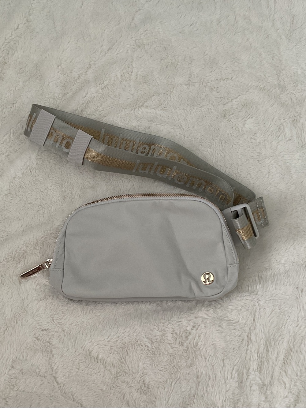 lululemon athletica light gray belt bag with gold trim excellent condition